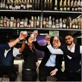 men-with-glasses-of-whiskey